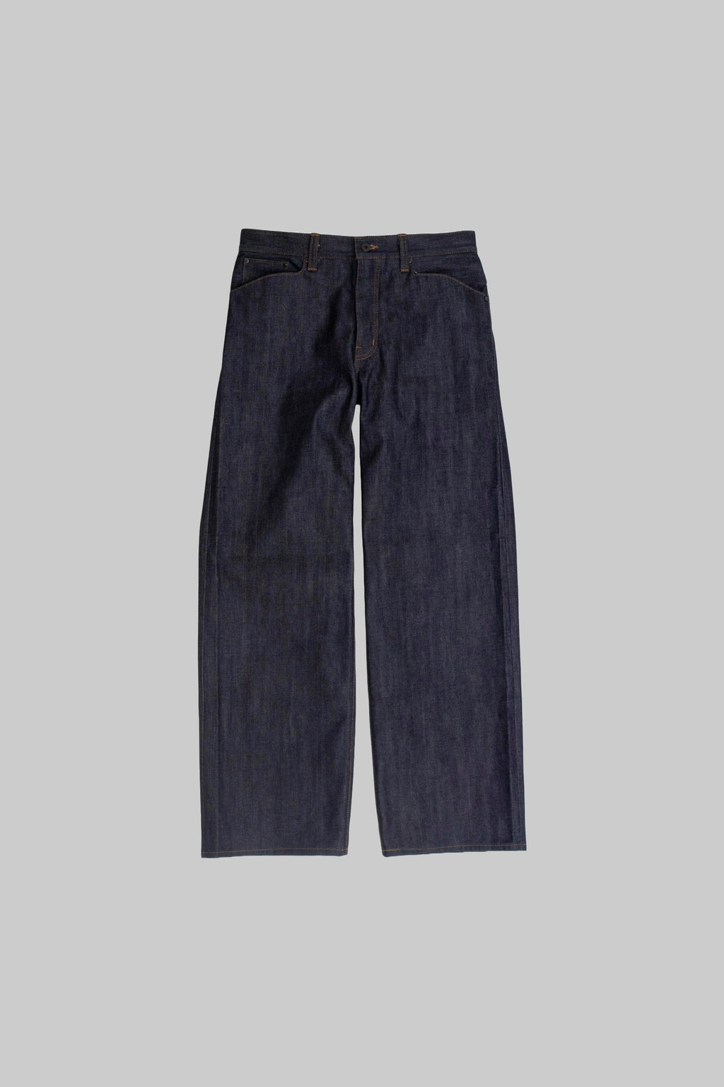 dark blue denim jeans grey background