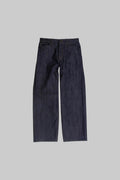 dark blue denim jeans grey background